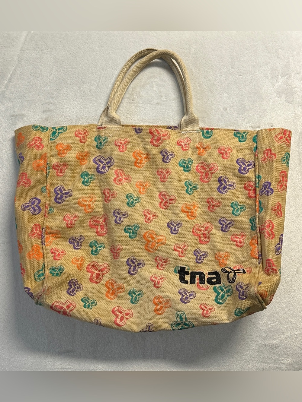 Y2K TNA multicolour logo print woven jute tote bag